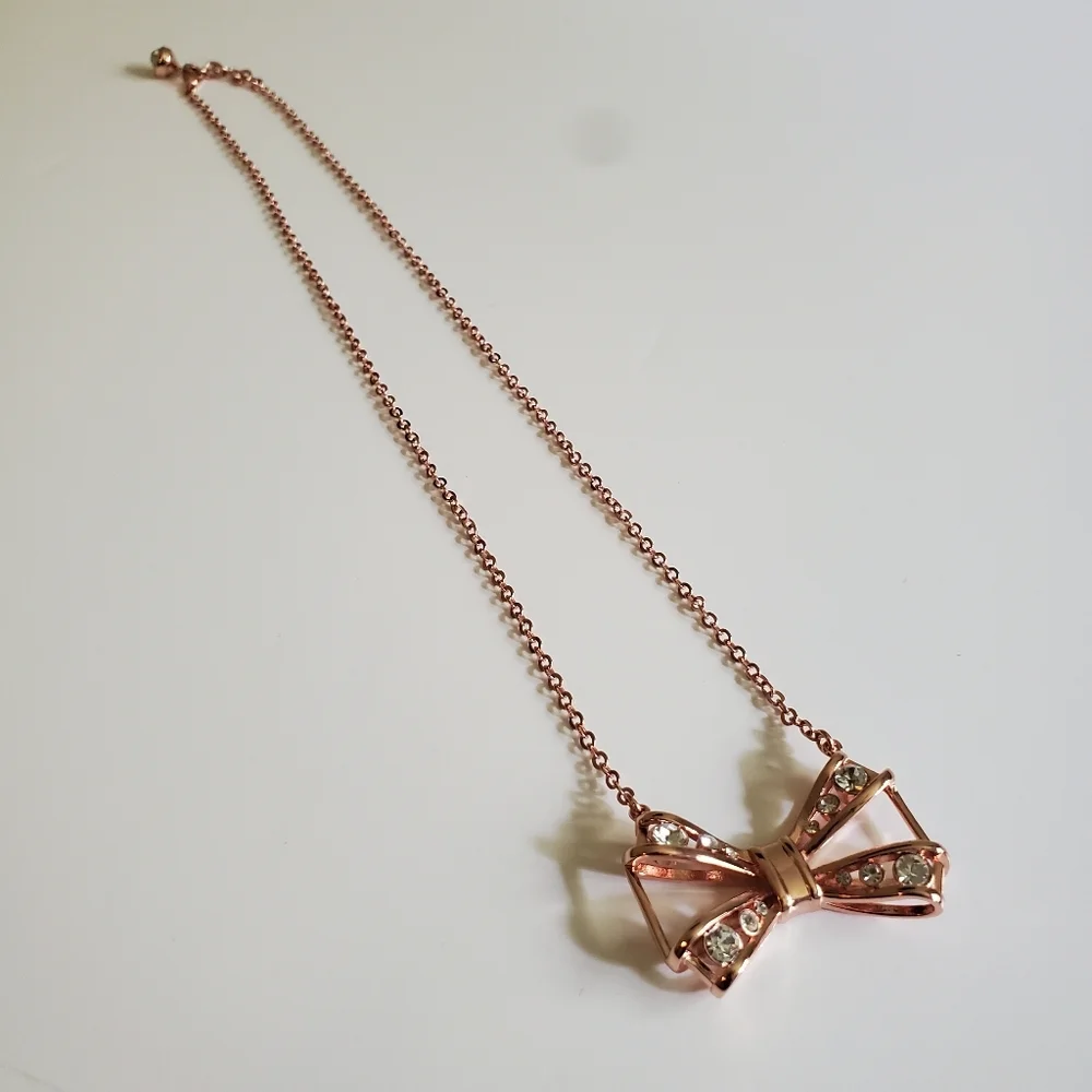 Ted Baker Gianni ROSE GOLD Joia Geometric Bow Pendant Necklace